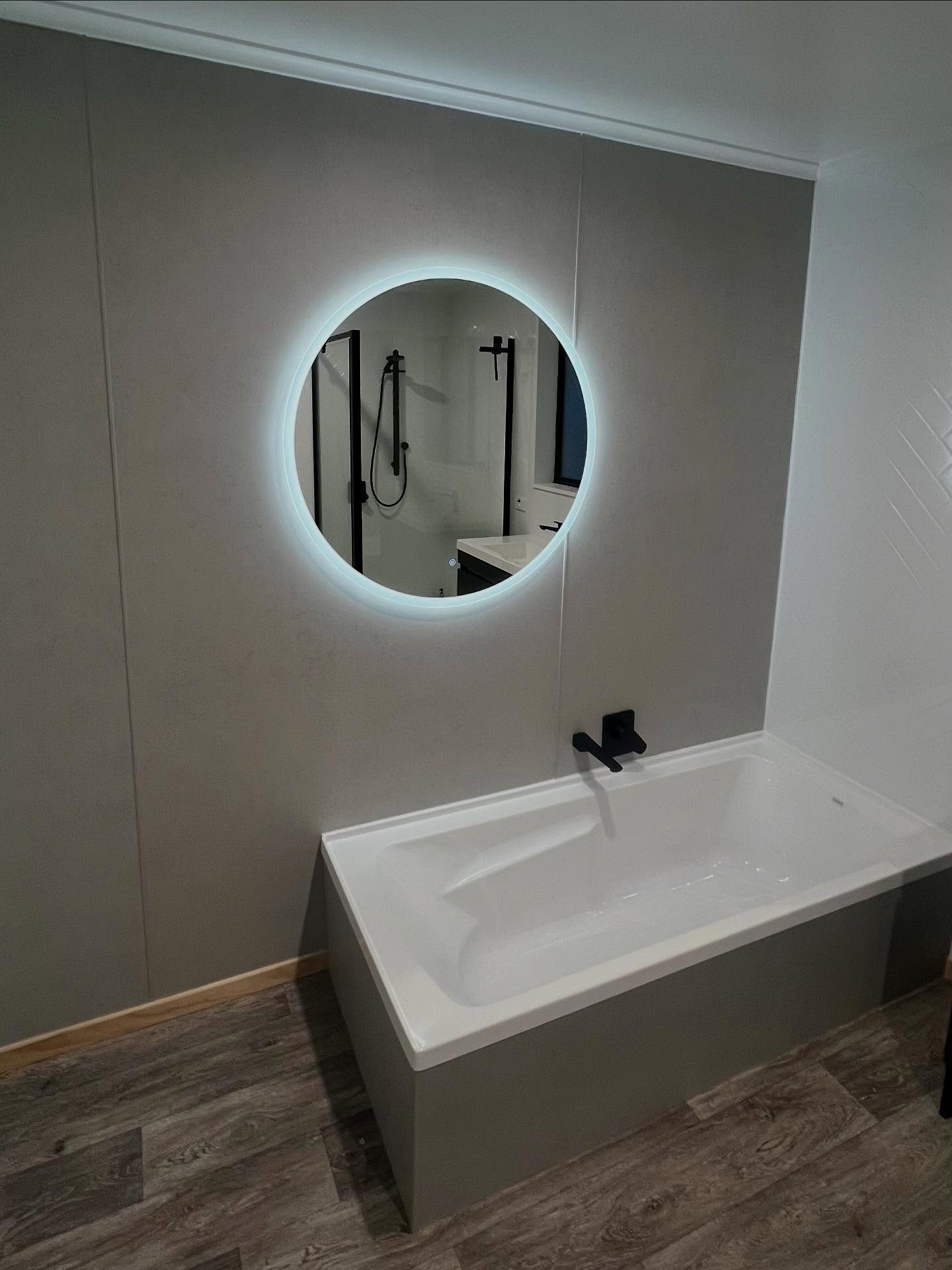 Modern white herringbone tile feature wall